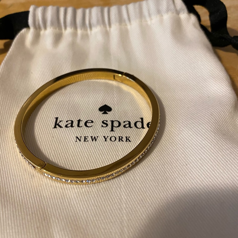 Kate Spade yellow gold tone hinge bangle
